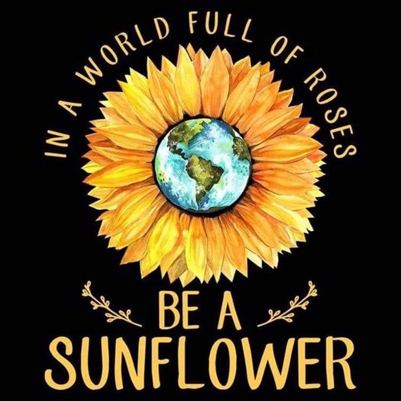 Sunflower with Earth at its center; text says,