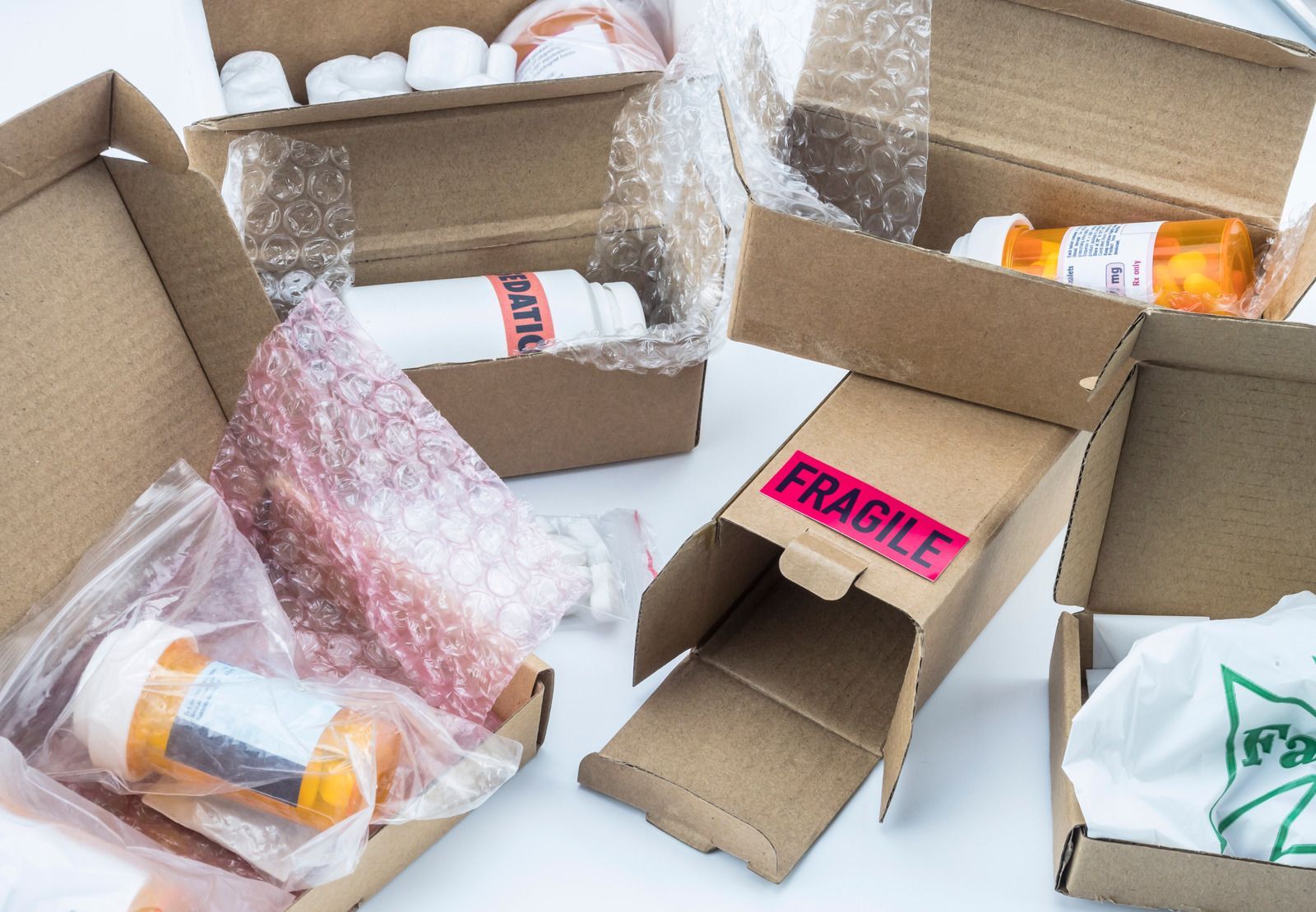 A cardboard box with a fragile sticker on it