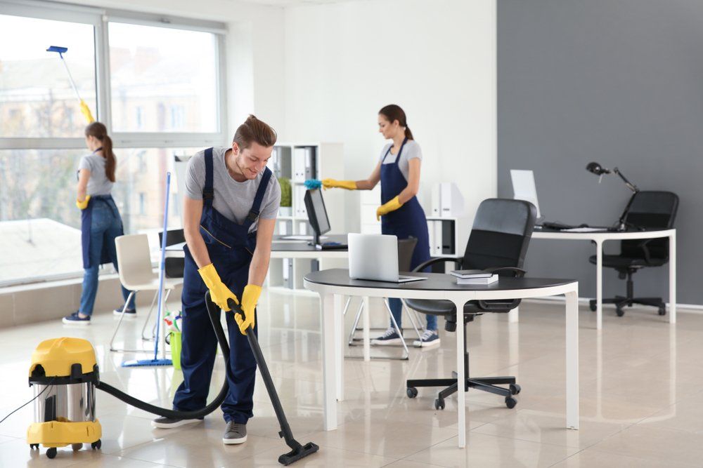 janitors cleaning office