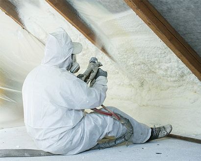 A Worker Spraying A Foam — Albany, GA — Georgia Foam Solutions Inc.