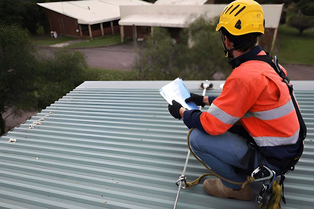 Looking Up at a Metal Roof With a Blue Sky in the Background — Ron Nickel Roofing in Tweed Heads South, NSW