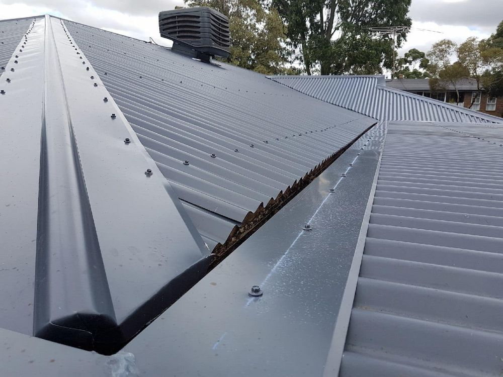 A Close Up of a Roof With a Gutter on It — Ron Nickel Roofing in Tweed Heads South, NSW
