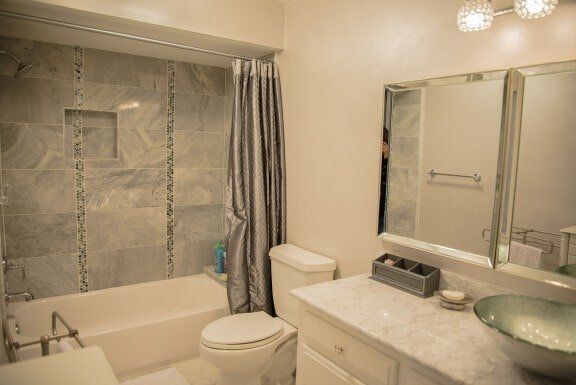 White Granite Bathroom — Complete Bathroom Remodel in Sun City, AZ