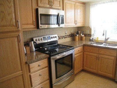 Brown Cabinets — Kitchen remodel in Sun City, AZ