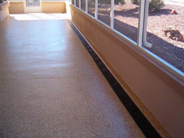 Epoxy concrete coating with chips with enclosed patio cover Sun City 5