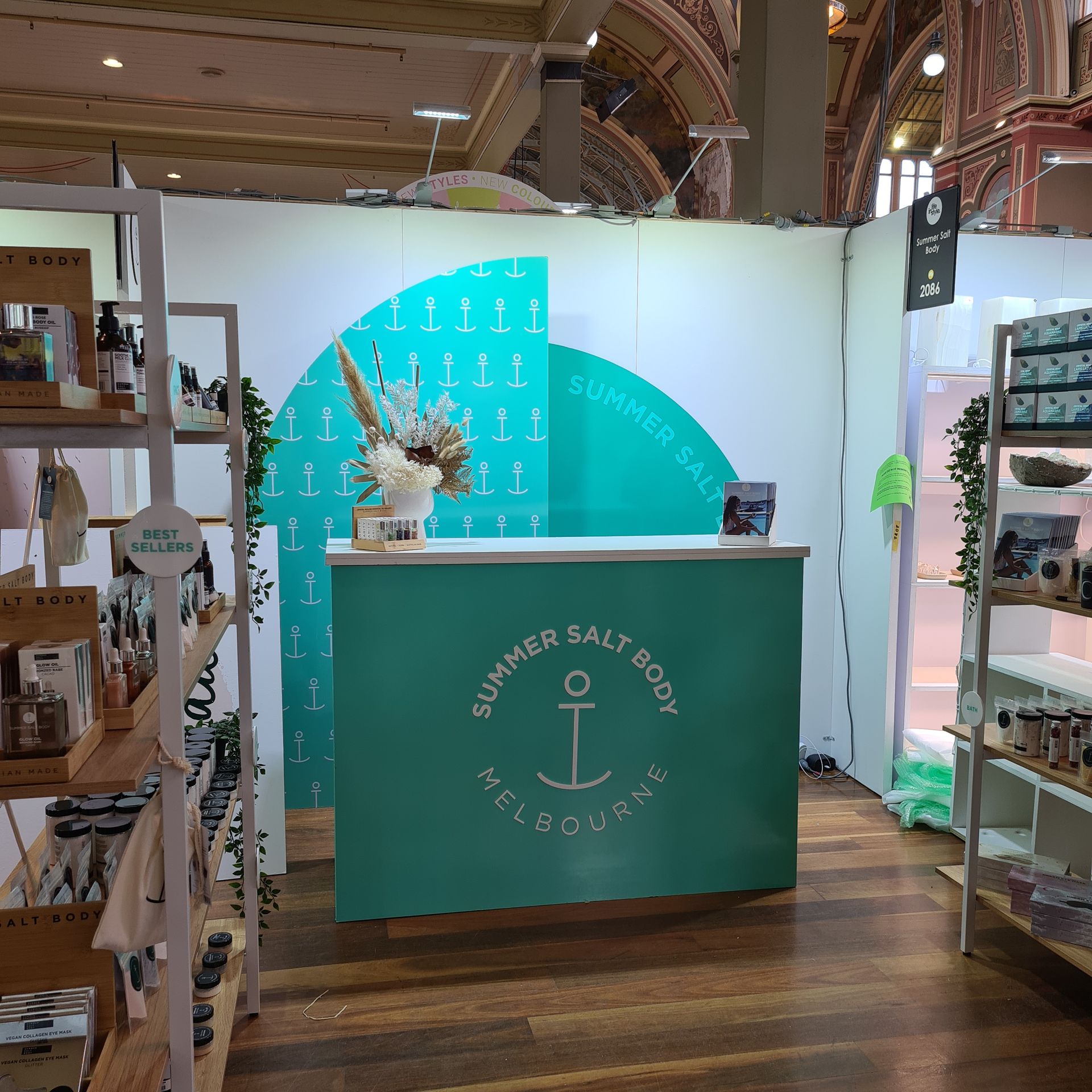 A store with a green counter that says summer salt boat melbourne