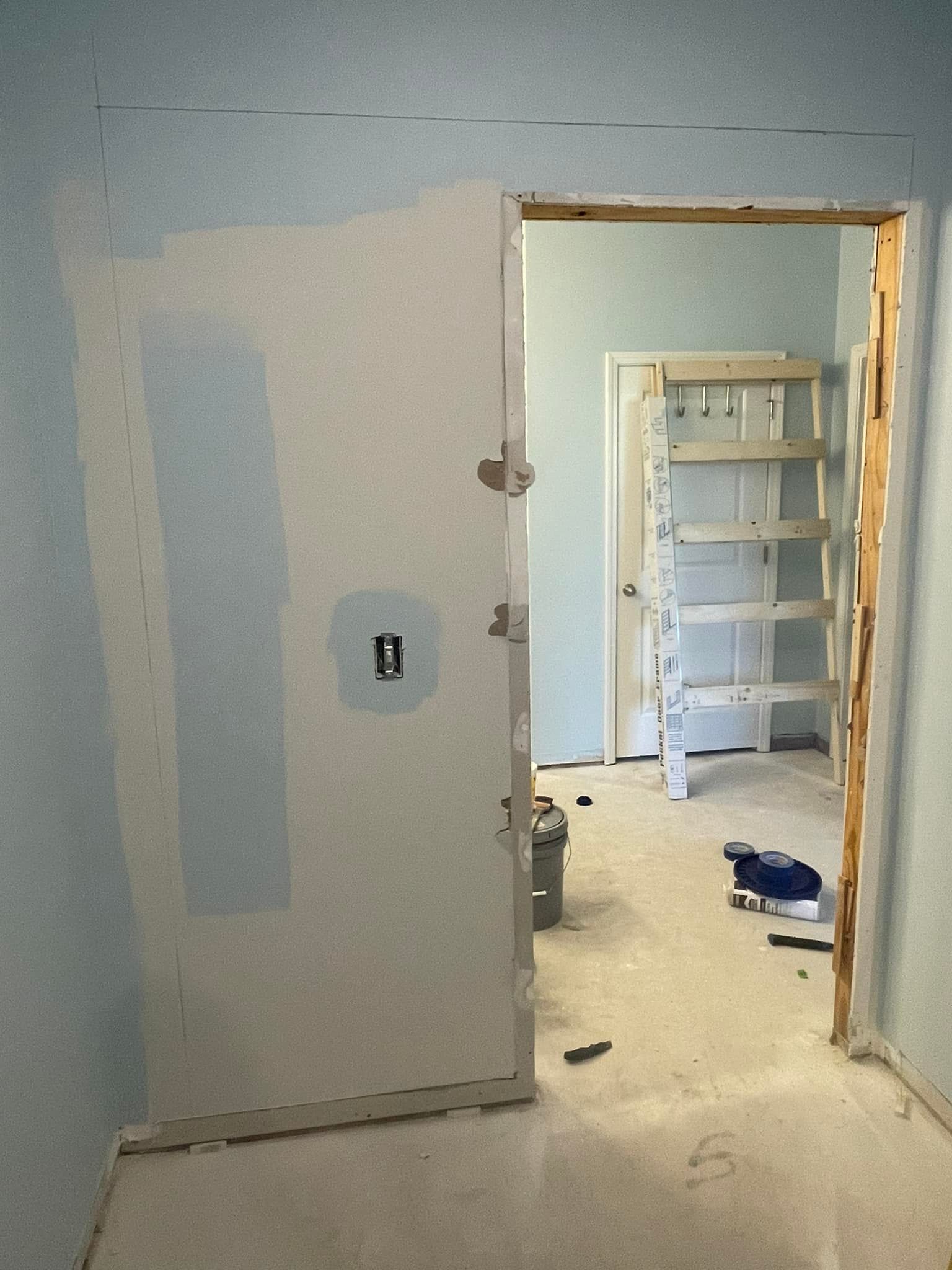 A room with a door that has the number 10 on it