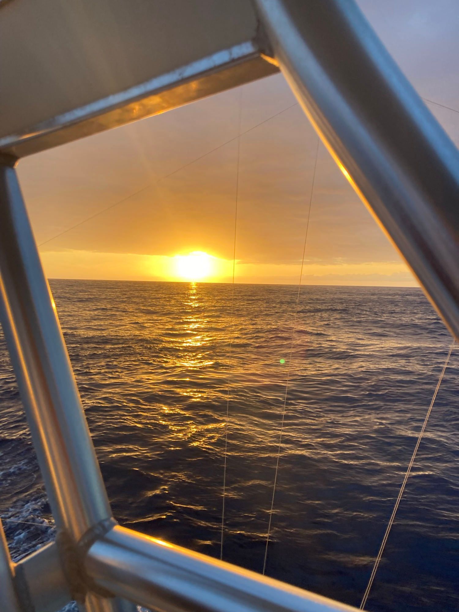 The sun is setting over a body of water