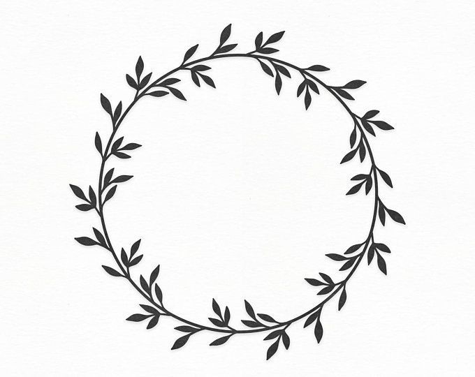 Uma coroa de folhas em um círculo sobre um fundo branco.