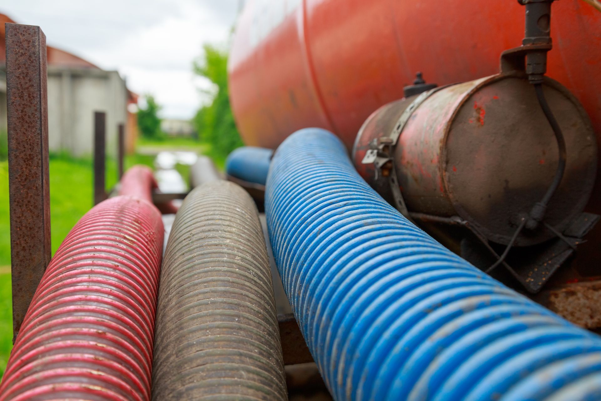 A bunch of hose sitting on top of a truck.