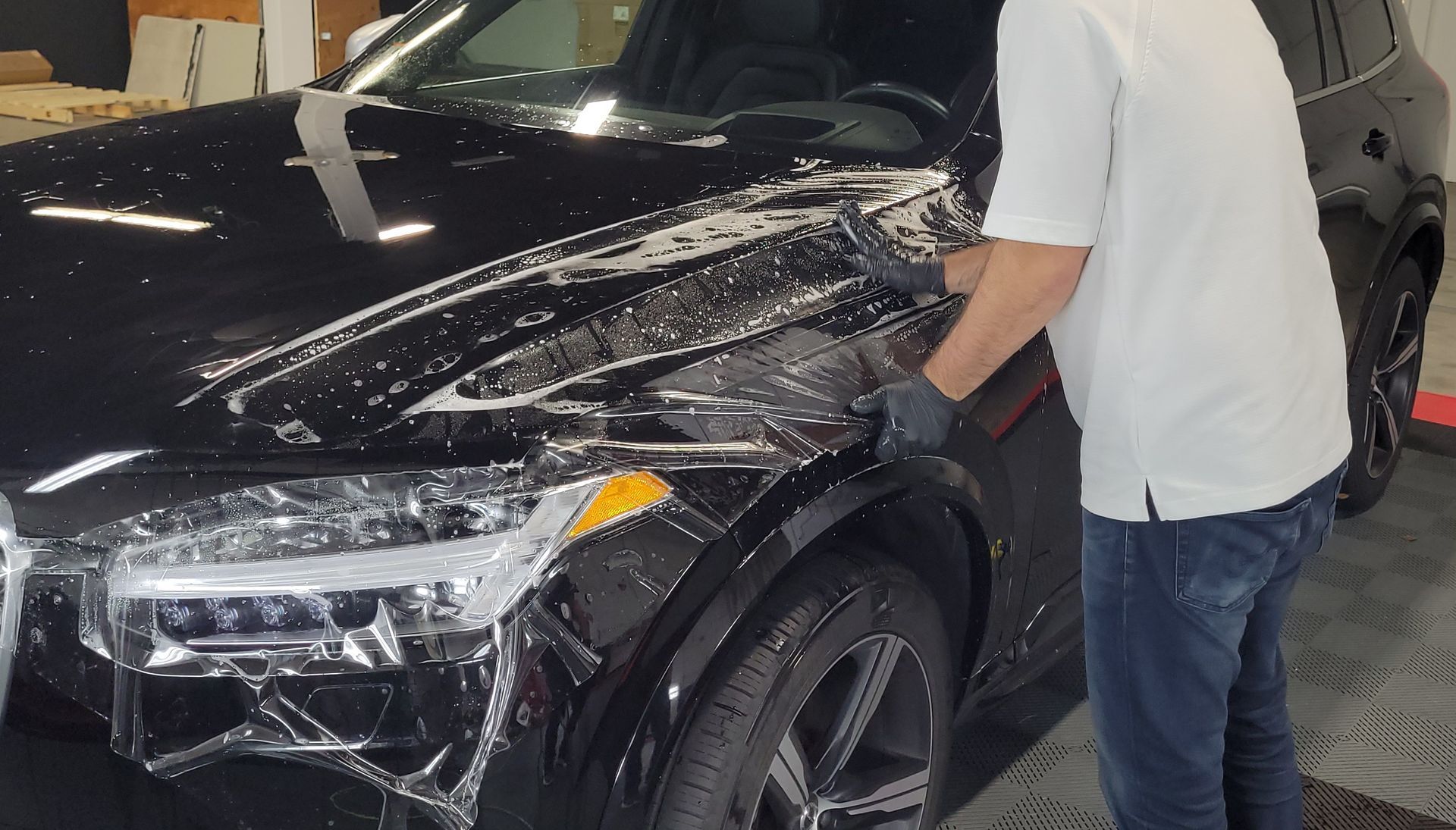 Dr Auto Spa is installing a paint protective film to prevent rock chips and scratch damages.
