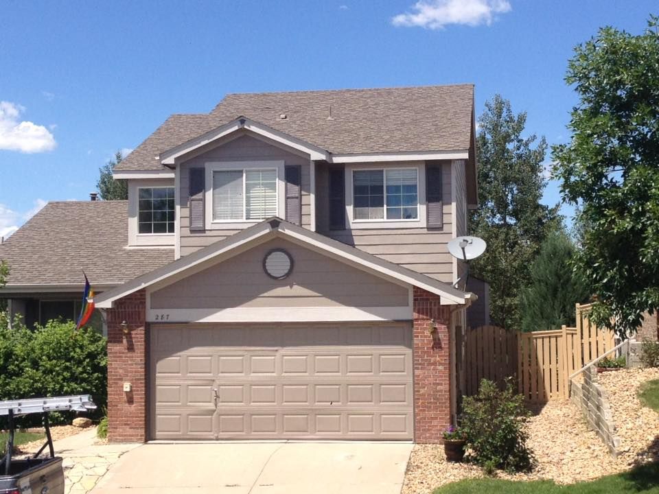A house with a satellite dish on the roof
