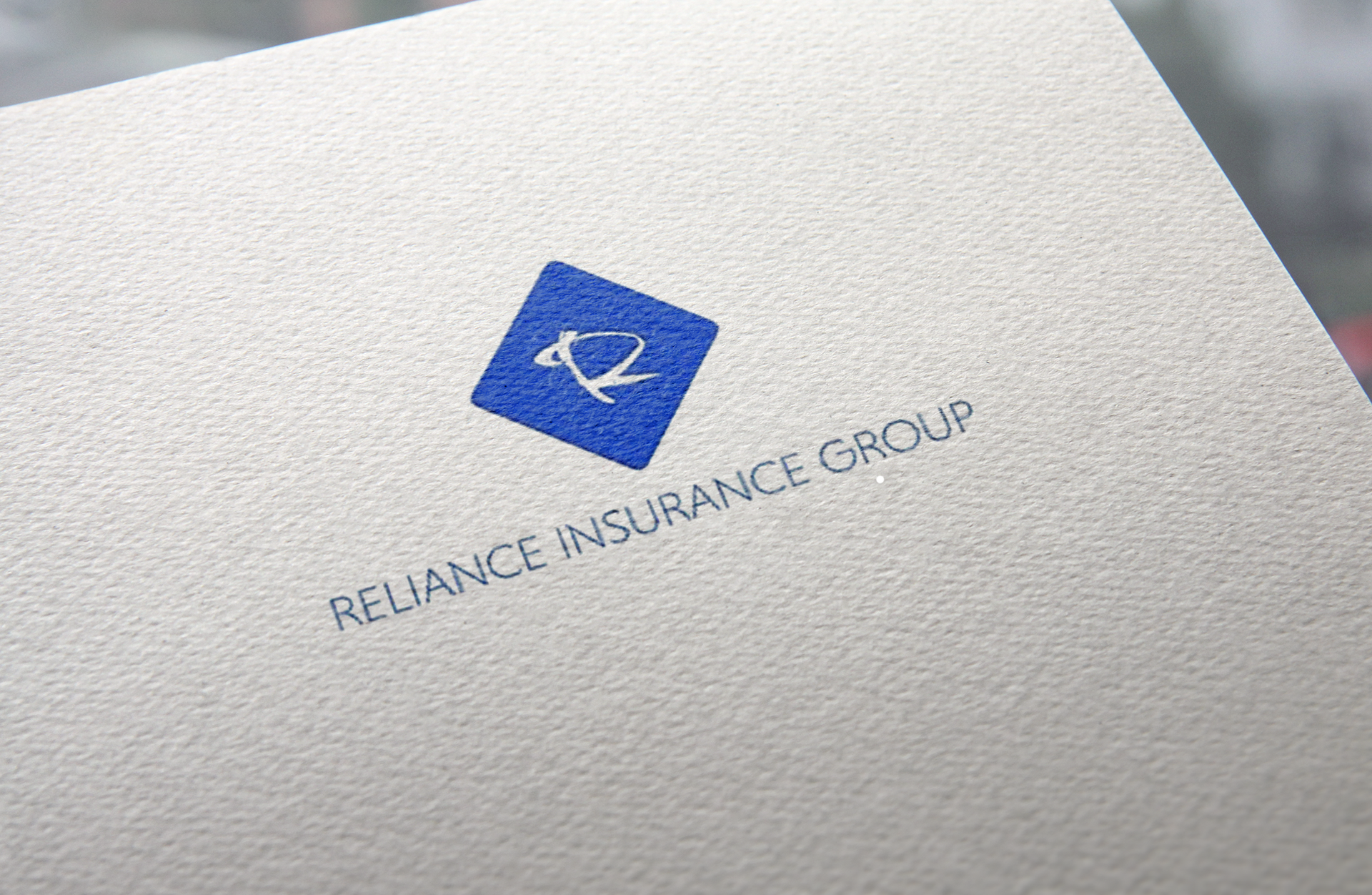 A group of business people are posing for a picture together