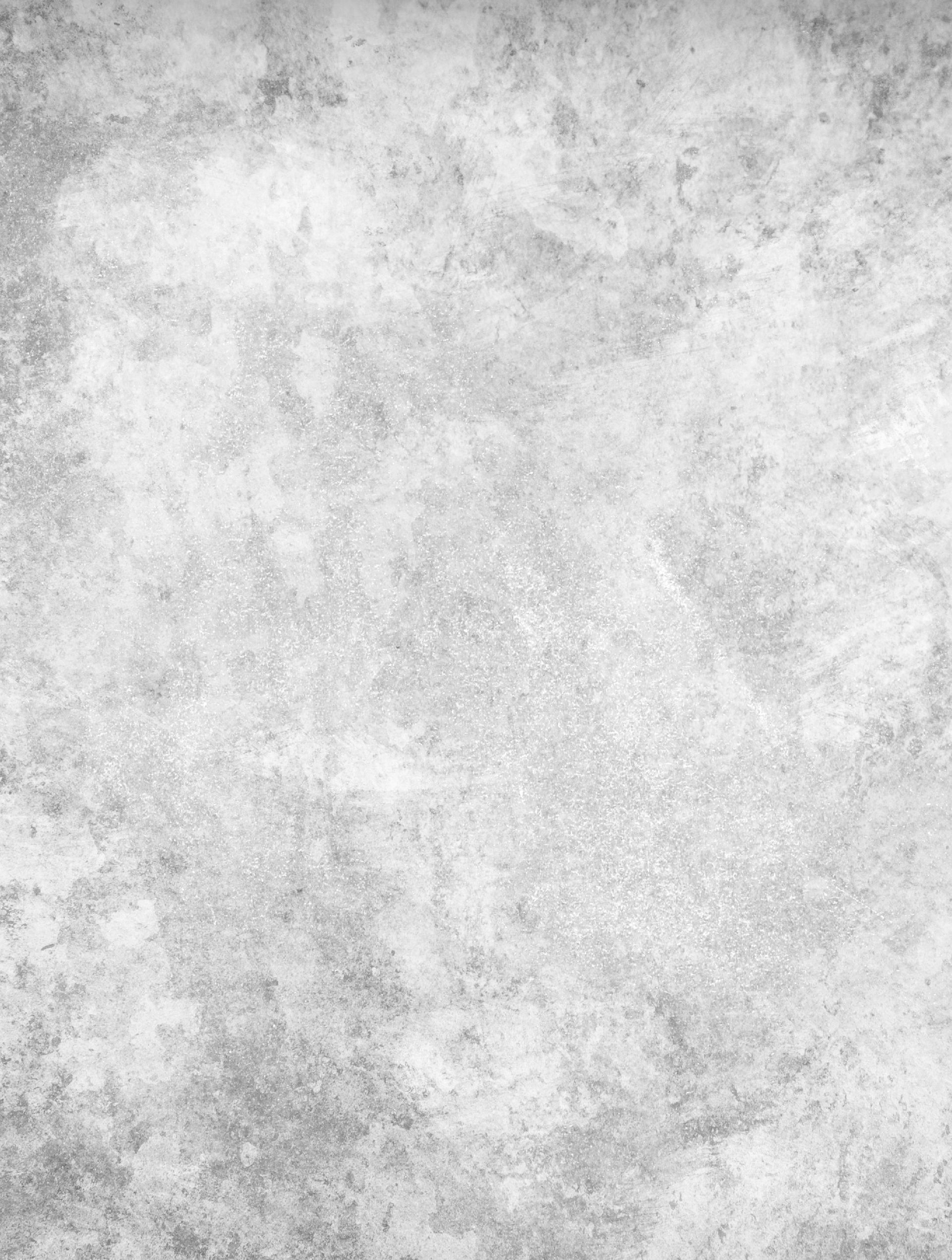 A close up of a white concrete wall texture.