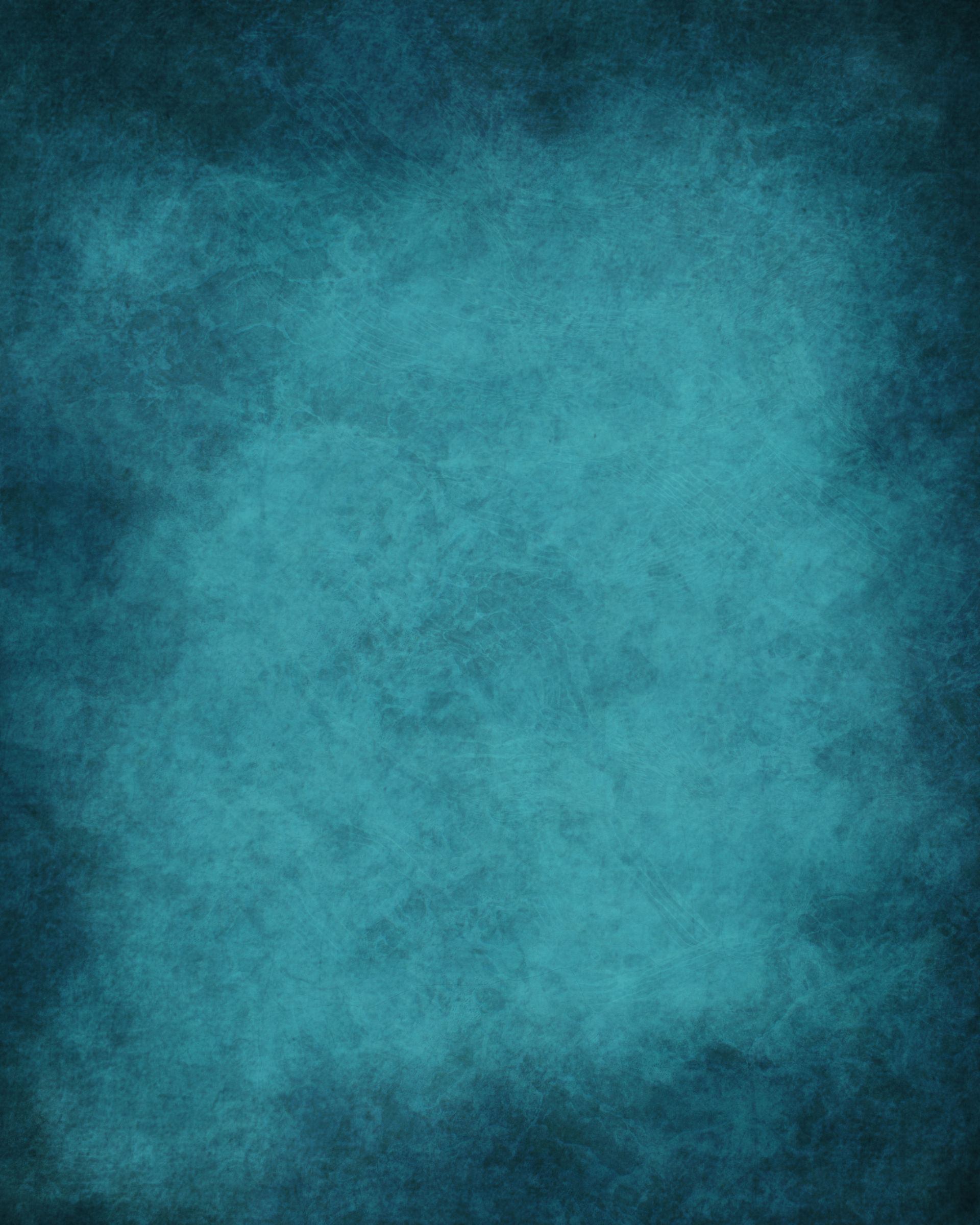A close up of a blue background with a grunge texture.