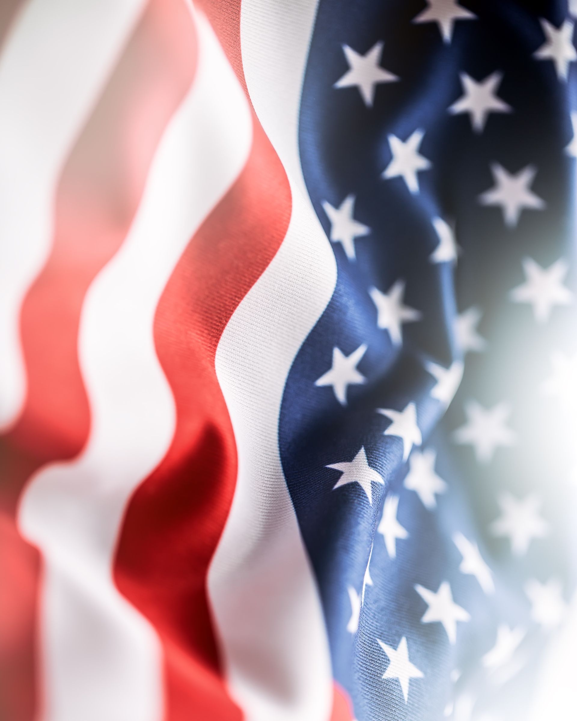 A close up of an american flag with stars on it