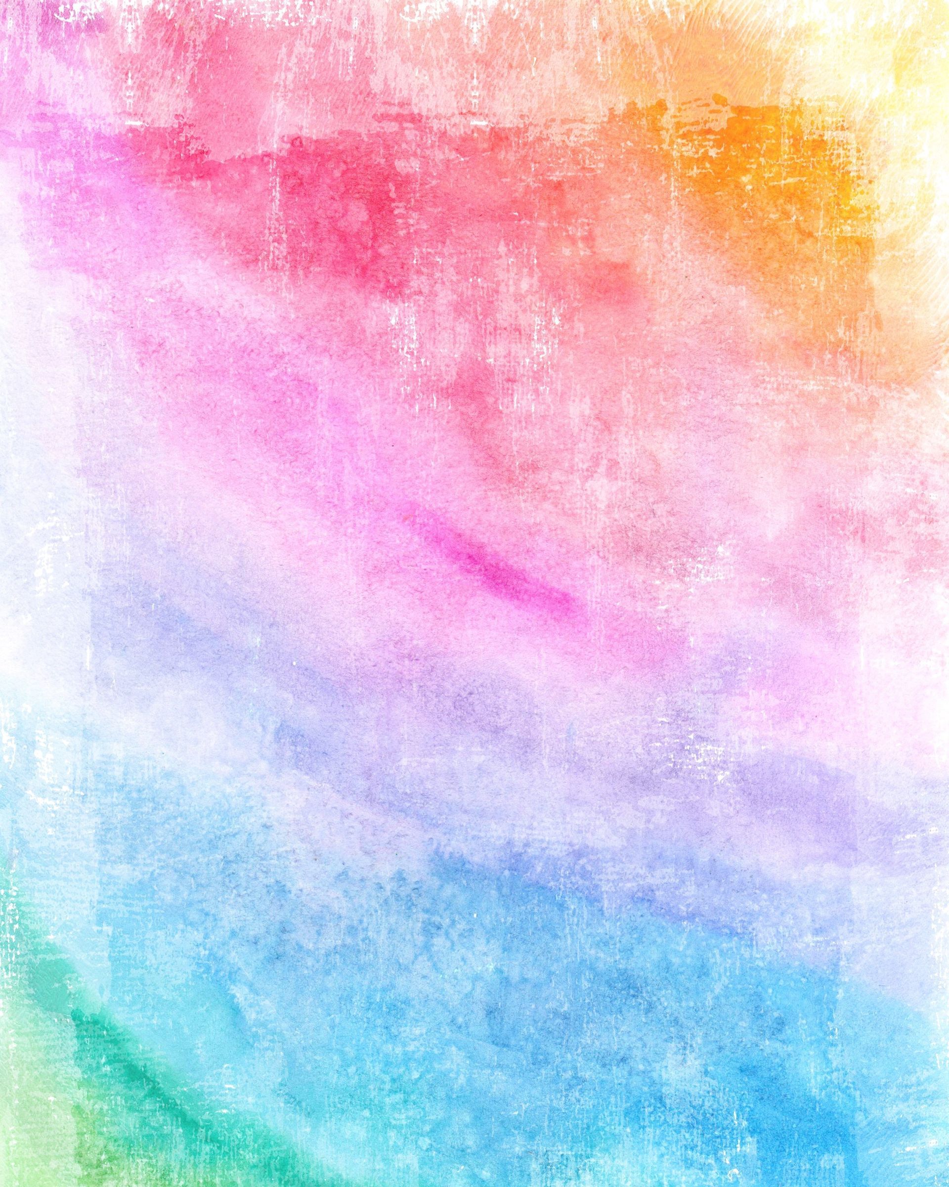 A colorful watercolor background with a rainbow of colors