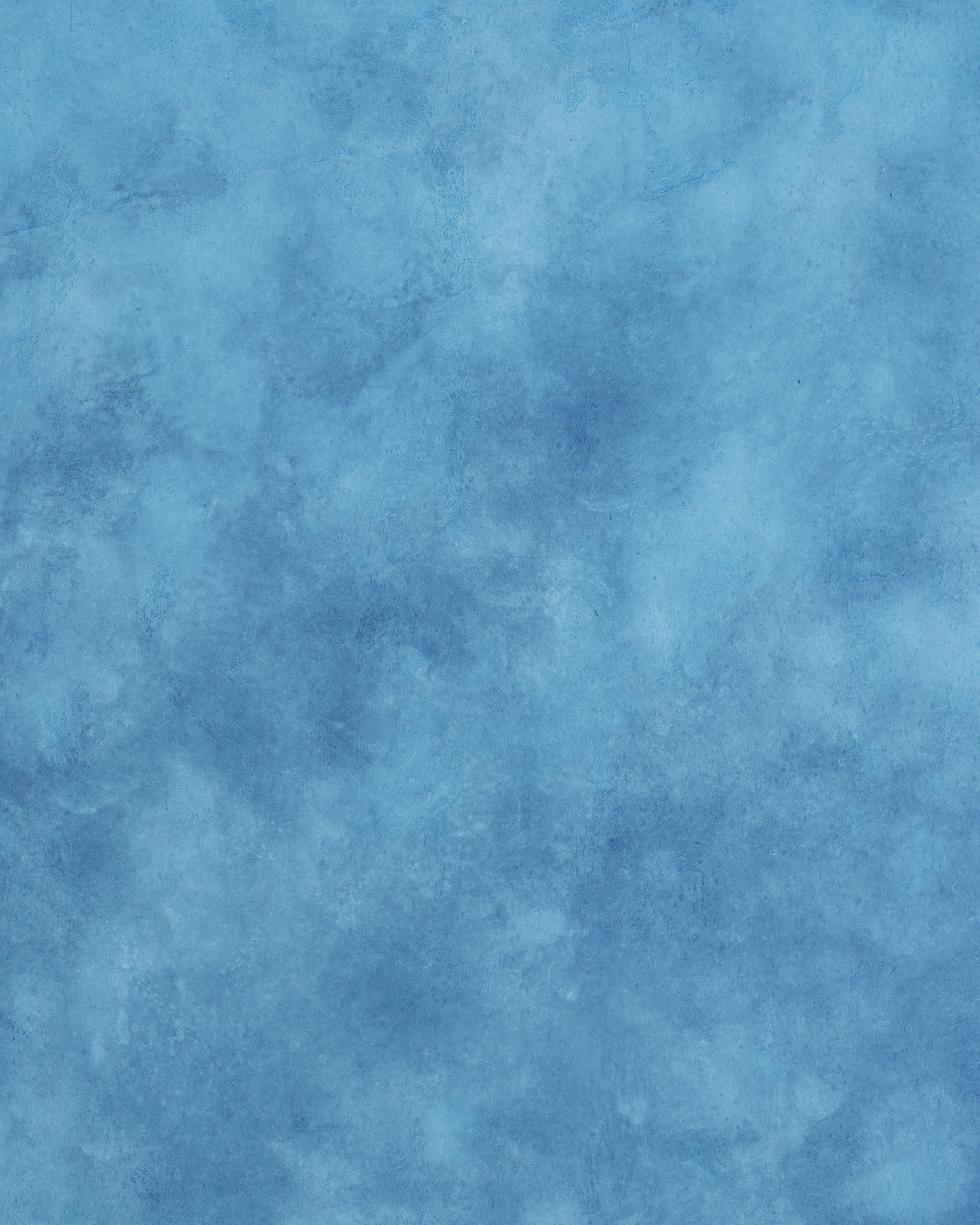 A close up of a blue paper texture.
