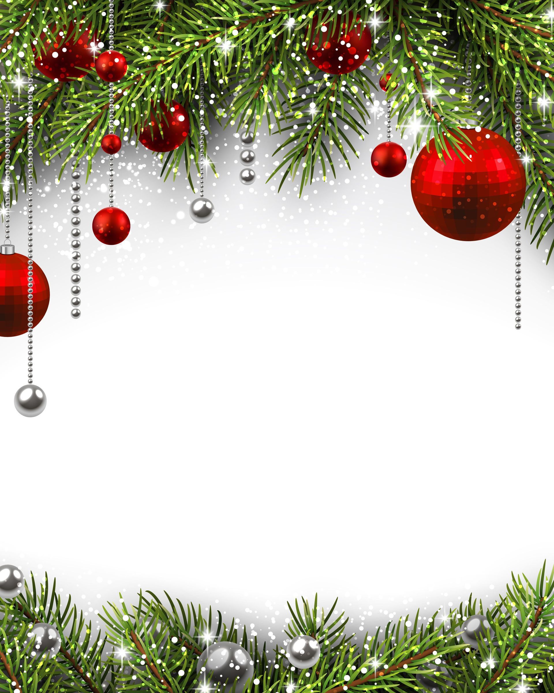 Christmas decorations hanging from a christmas tree branch on a white background.