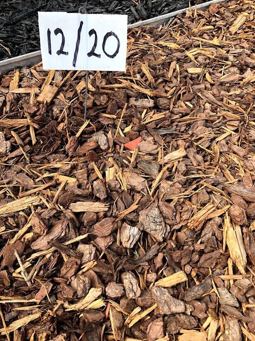 A Person is Digging in the Dirt With a Shovel — Wodonga Sand & Soil in Wodonga, VIC