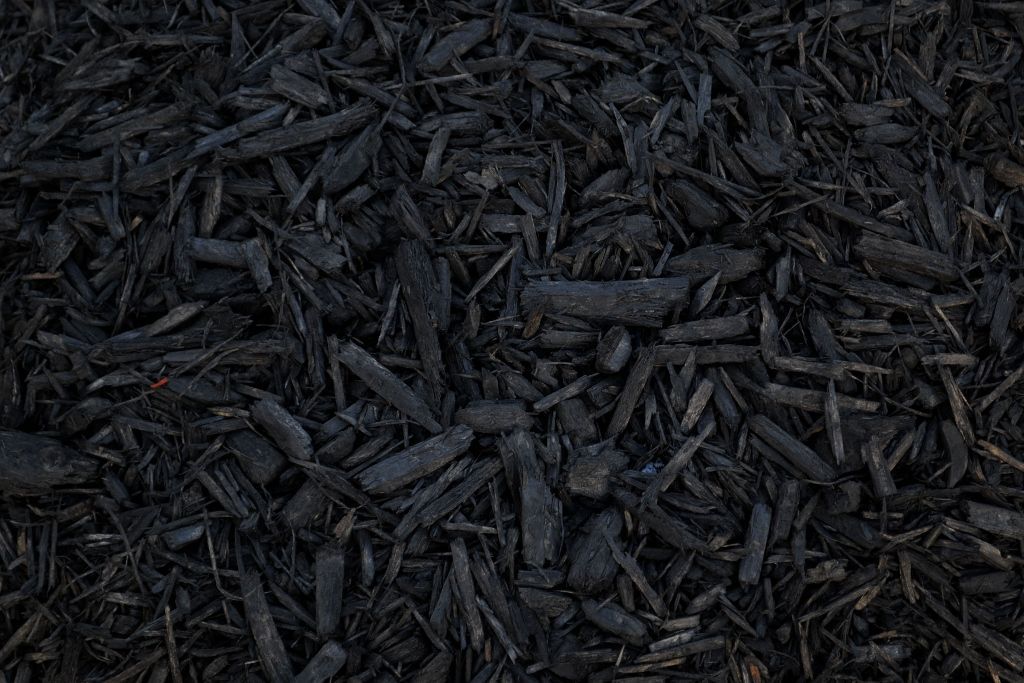 A Pile of Brown Mulch is Sitting on the Ground — Wodonga Sand & Soil in Wodonga, VIC