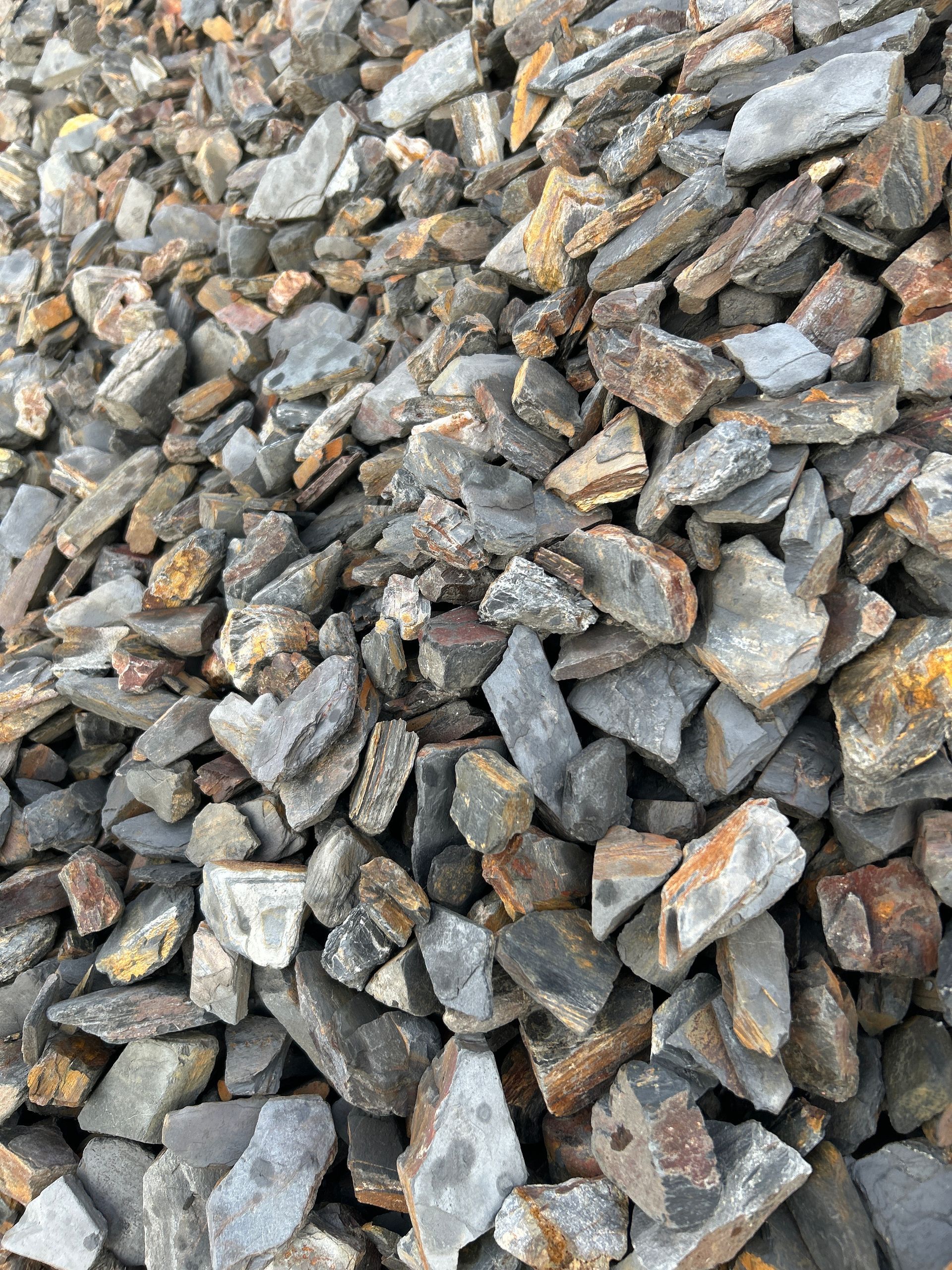 Pile Of Gray And Brown Decorative Slate Gravel — Wodonga Sand & Soil in Wodonga, VIC