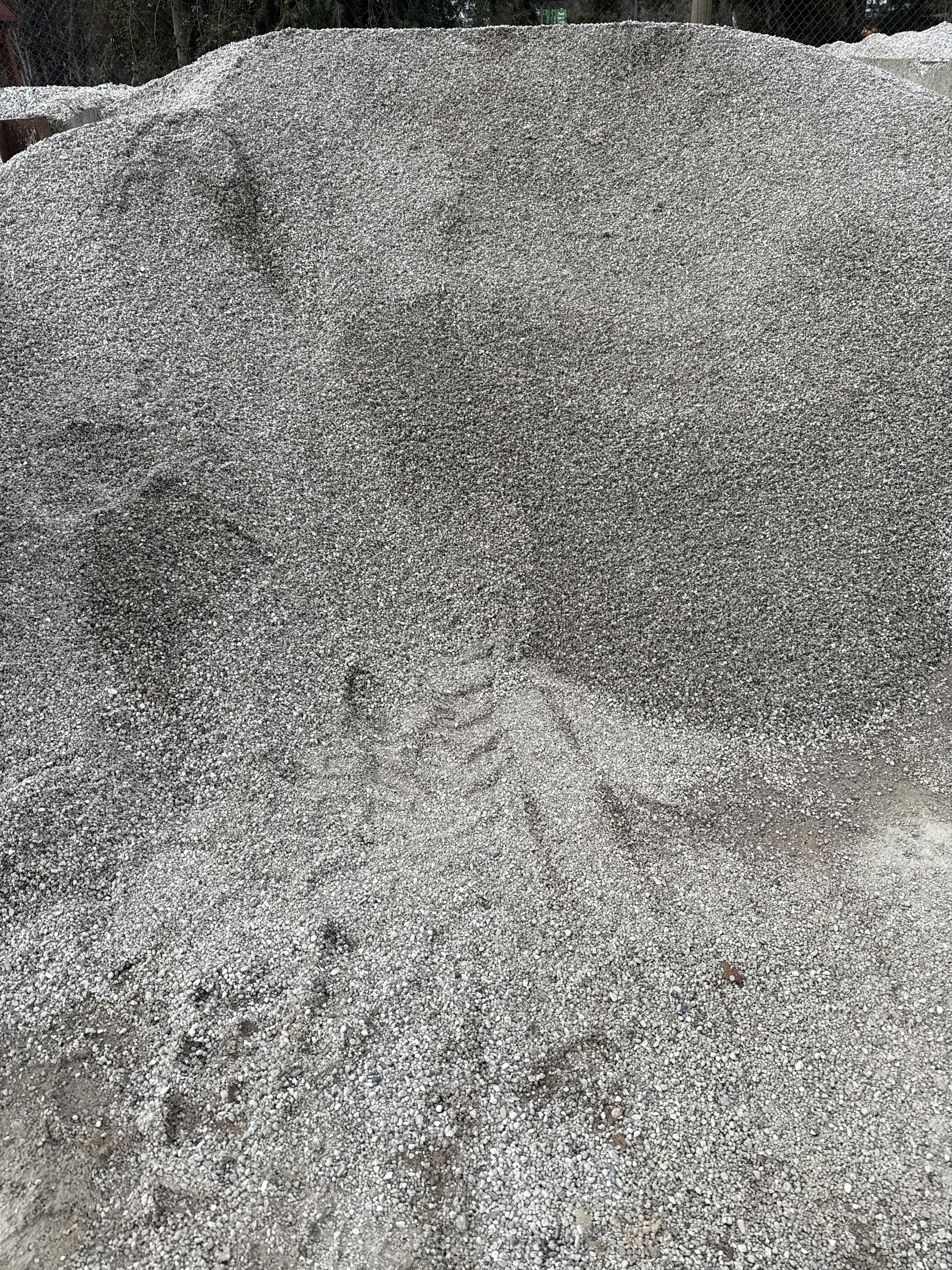 A Pile of Gravel is Sitting on Top of a Concrete Block — Wodonga Sand & Soil in Wodonga, VIC