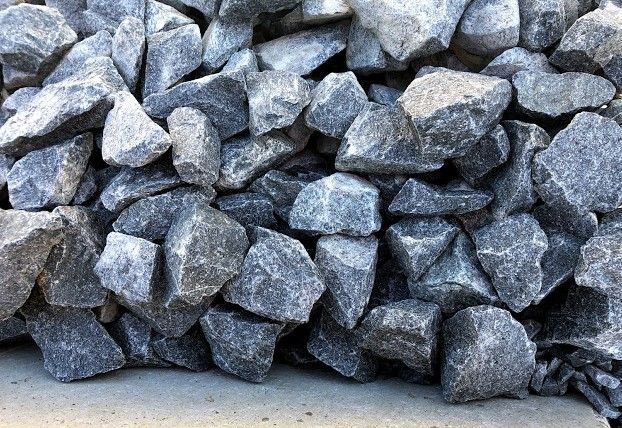 A Stone Walkway in a Garden Surrounded by Flowers and Plants — Wodonga Sand & Soil in Wodonga, VIC