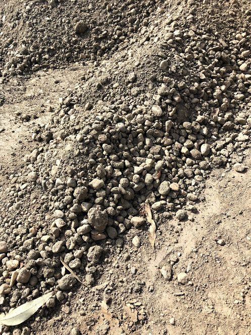 Pile of brown gravel and dirt, likely for landscaping or construction purposes. — Wodonga Sand & Soil in Wodonga, VIC