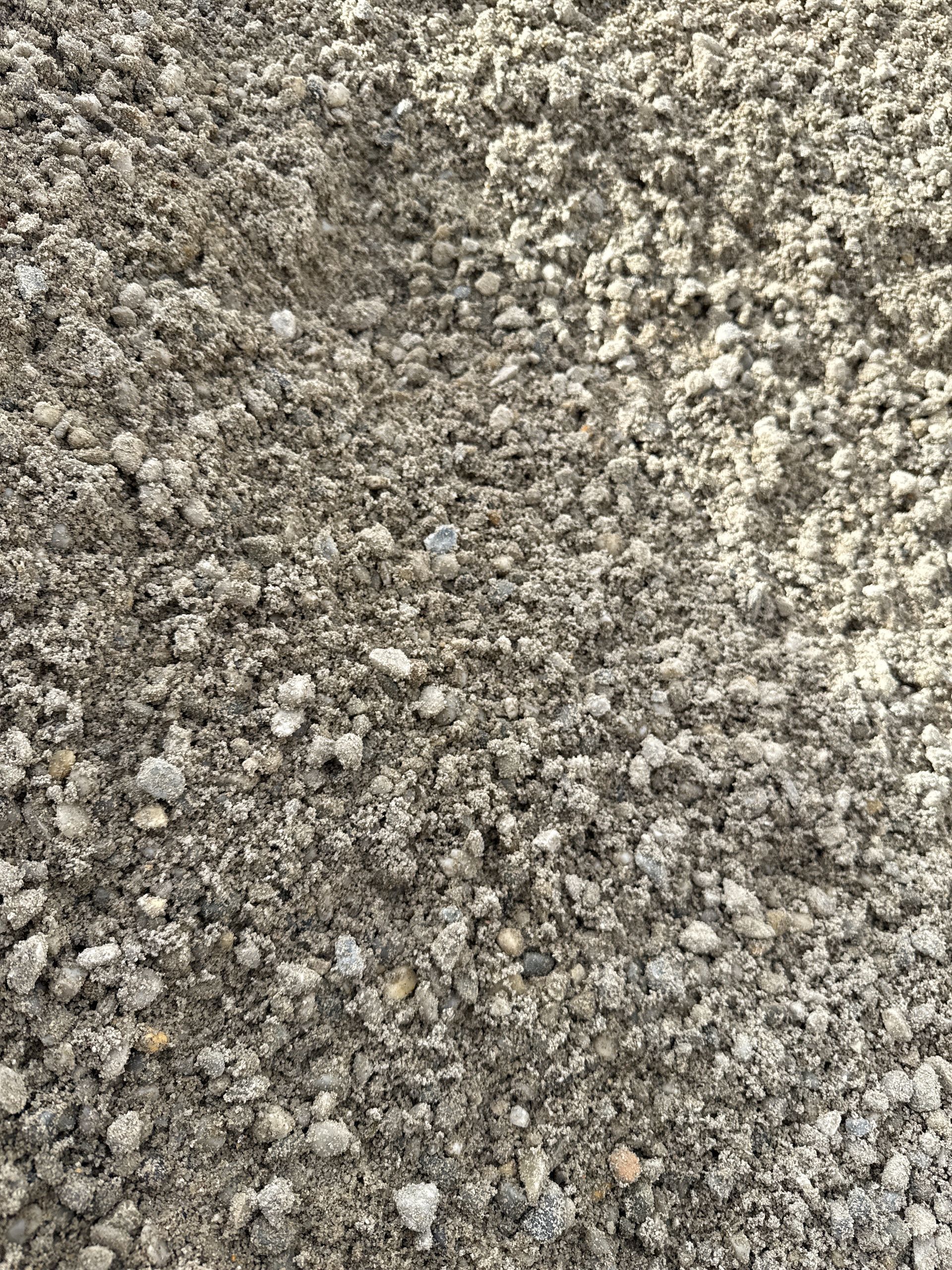 Close-up of gray gravel with small pebbles and sand, showing different colors and textures. — Wodonga Sand & Soil in Wodonga, VIC