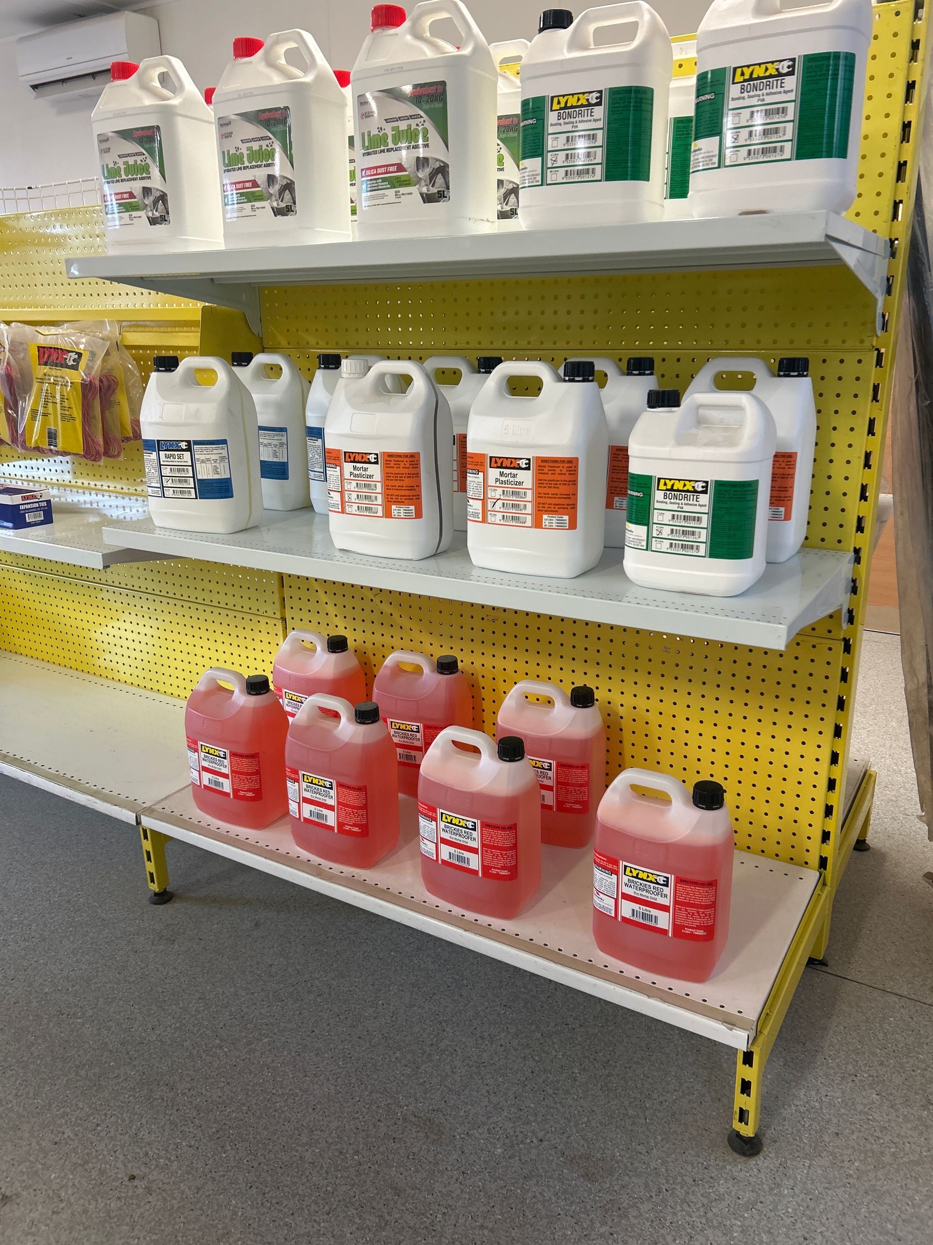 Shelves stocked with various bottles of cleaning products; the display is in a store setting. — Wodonga Sand & Soil in Wodonga, VIC