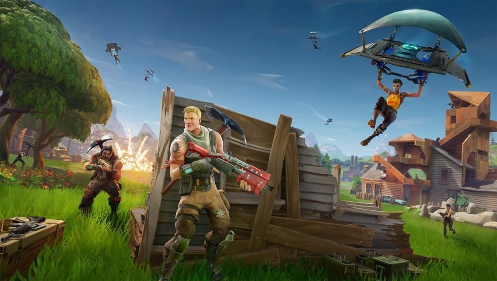 Fortnite players in a vibrant landscape with a wooden structure, one holding a red weapon and another gliding above.