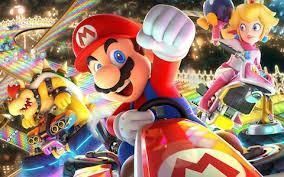Mario, Peach, and Bowser racing karts on a colorful, glowing track with a vibrant, energetic atmosphere.