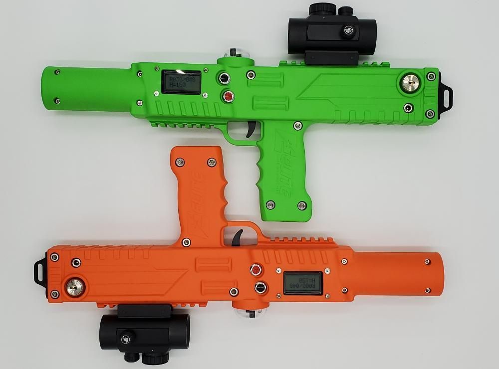 A green and an orange toy laser tag blaster, each with a black red-dot sight, arranged on a plain white background.