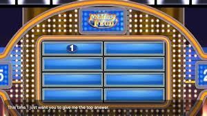 The Family Feud game board screen displays an empty grid with eight blank answer slots and a number one in the first slot.