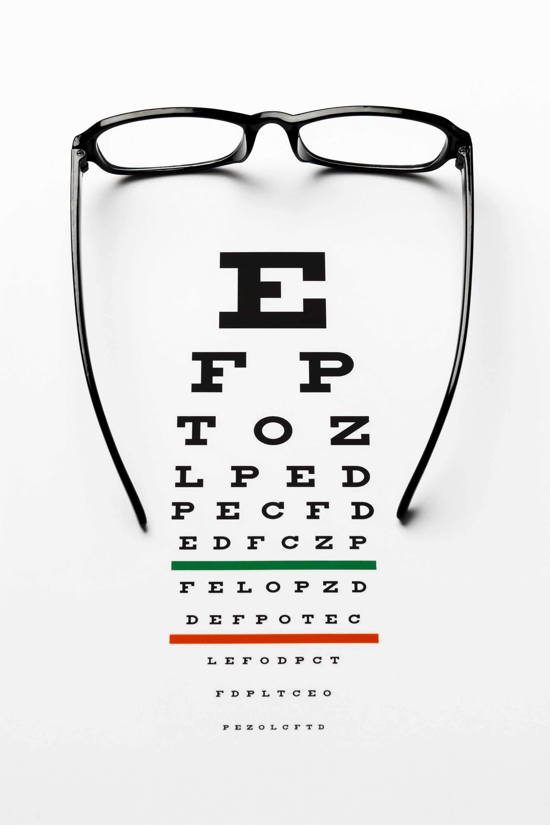 Glasses on Eye Chart — Campbelltown, AU — The Optical Shop