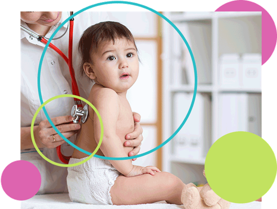 Baby being examined by a doctor with a stethoscope.