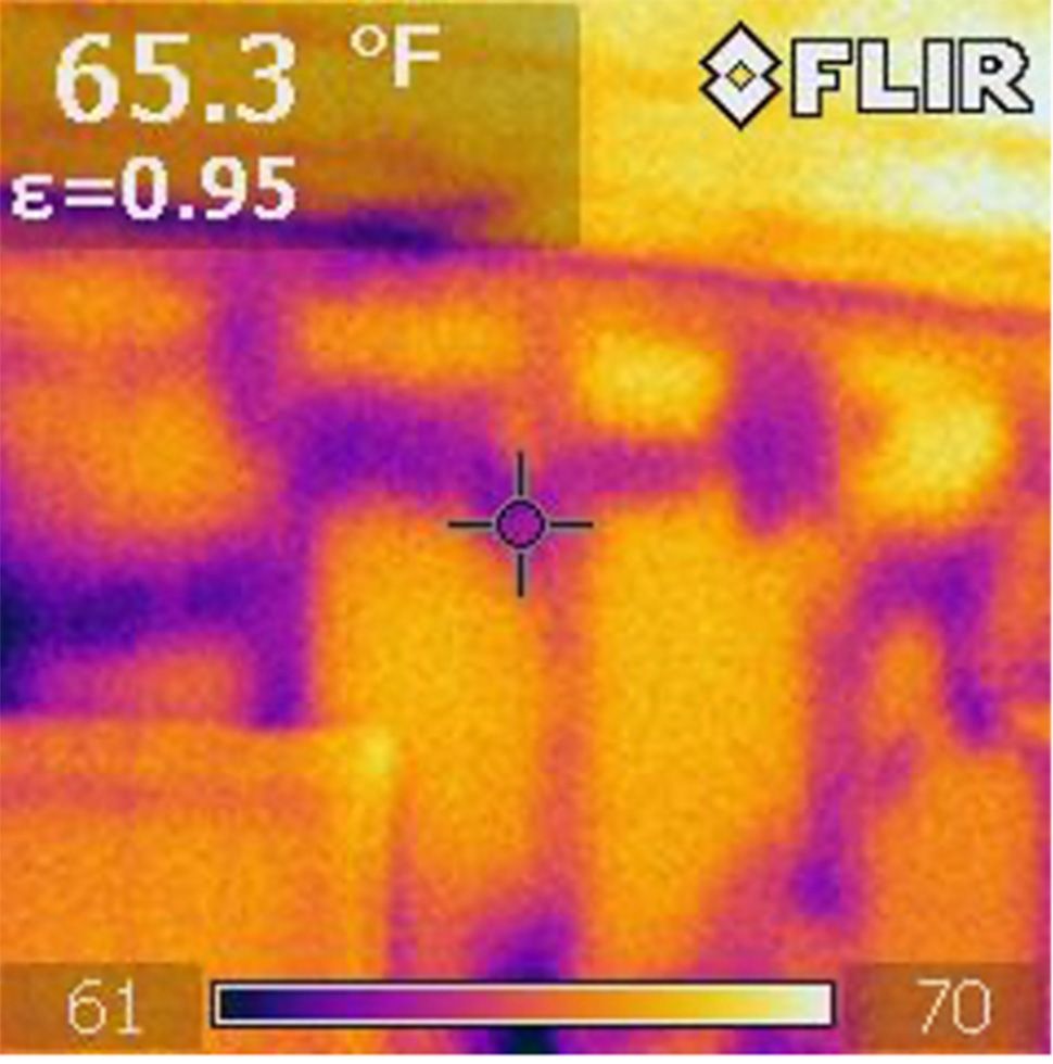 A thermal image of a building shows a temperature of 65.3 degrees fahrenheit.