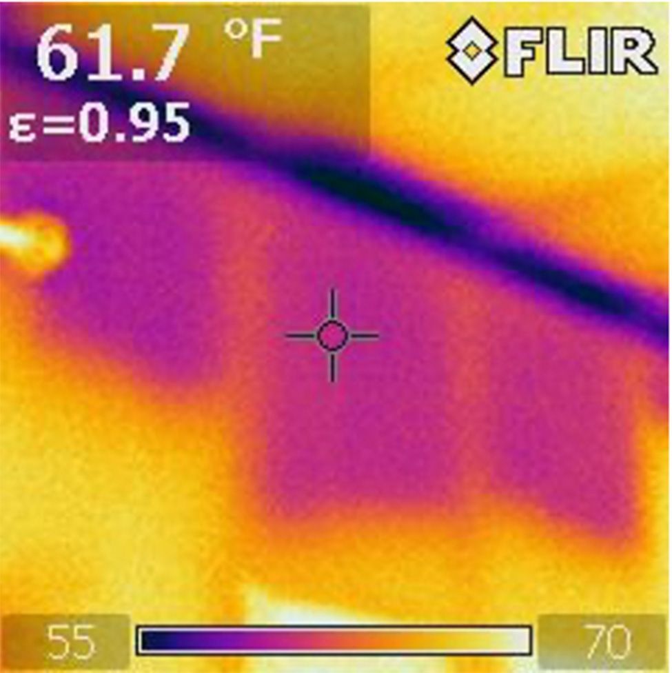A thermal image of a building with a temperature of 61.7 degrees fahrenheit.