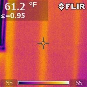 A thermal image of a wall showing a temperature of 61.2 degrees fahrenheit