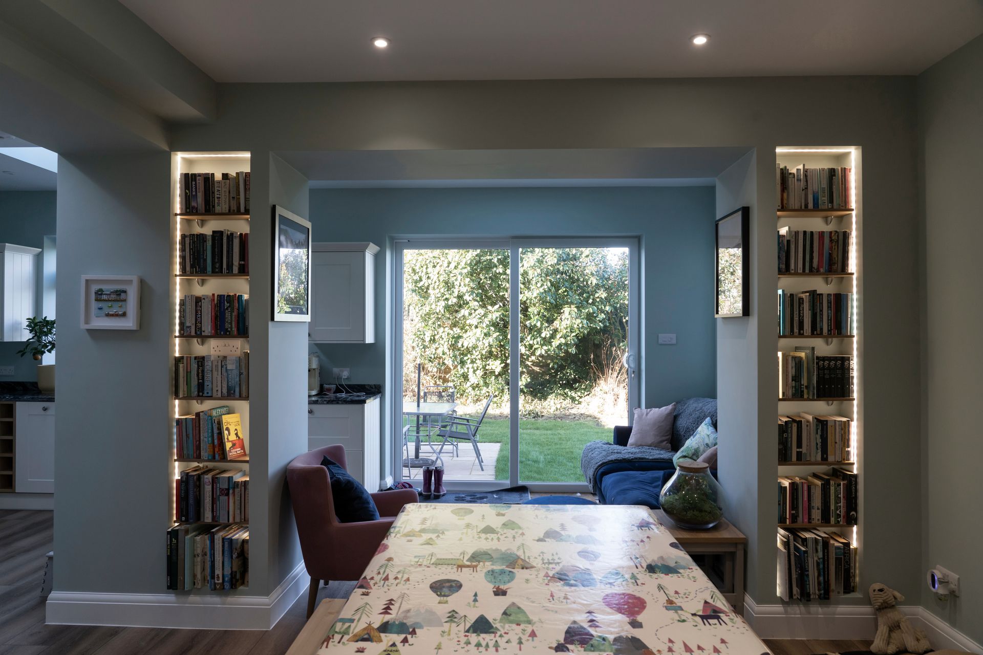 A small wooden house with a window in the backyard in a Construction Management in East Sussex