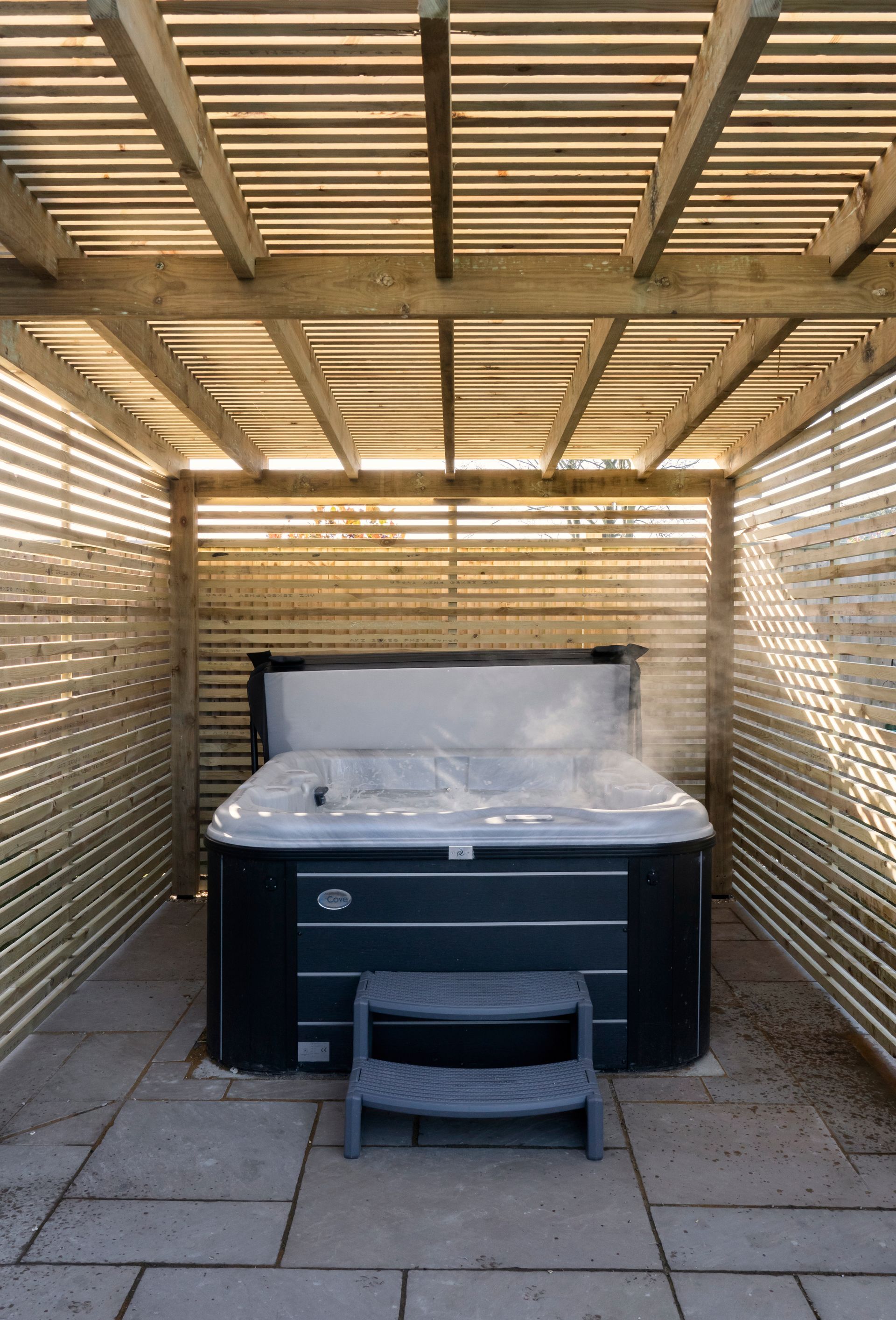 A kitchen with a subway sign on the wall in a Large-Scale Retrofitting in Tenterden