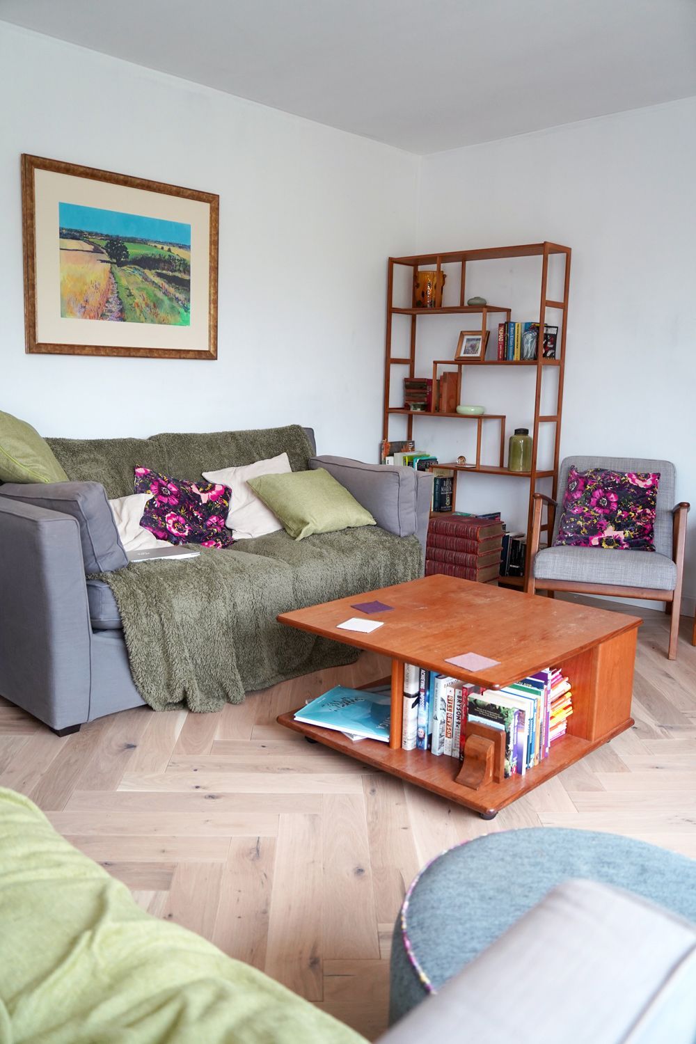 A living room with a couch and a coffee table  in a Passivhaus New Builds in East Sussex