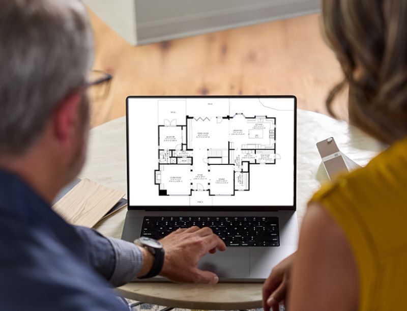 Man And A Woman Are Looking At A Floor Plan On A Laptop — Marlboro, NY — Safety 360