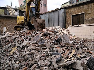 Excavator on Construction Waste Site — Efficient Waste Disposal in Gracemere, QLD