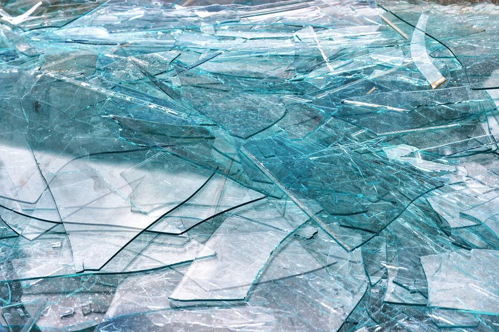 Pieces Of Broken Glass After Demolition — Efficient Waste Disposal in Gracemere, QLD