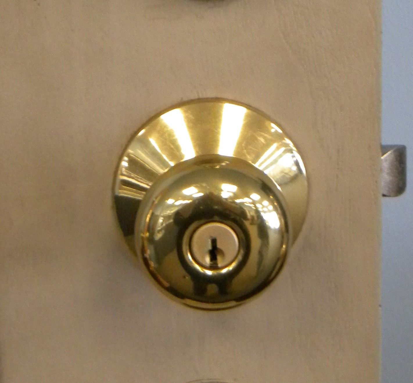 Close-up of a residential door knob lock.