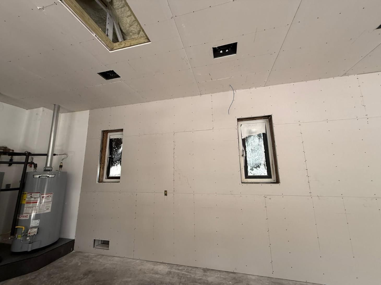 there is a ladder in the middle of the room .