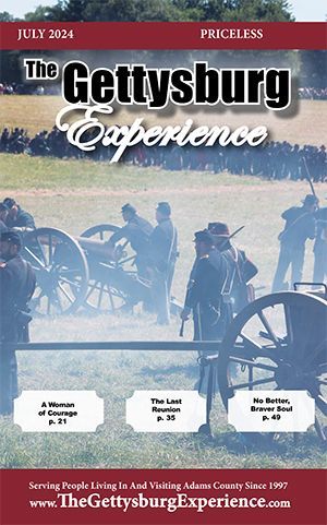 The cover of the Gettysburg Experience Magazine shows a painting of soldiers fighting each other. July 2024