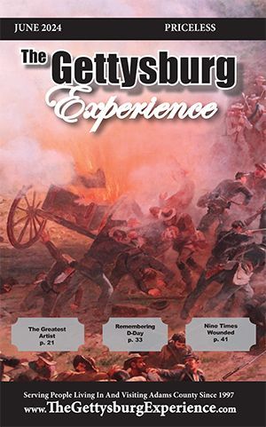 The cover of the Gettysburg Experience Magazine shows a painting of soldiers fighting each other.